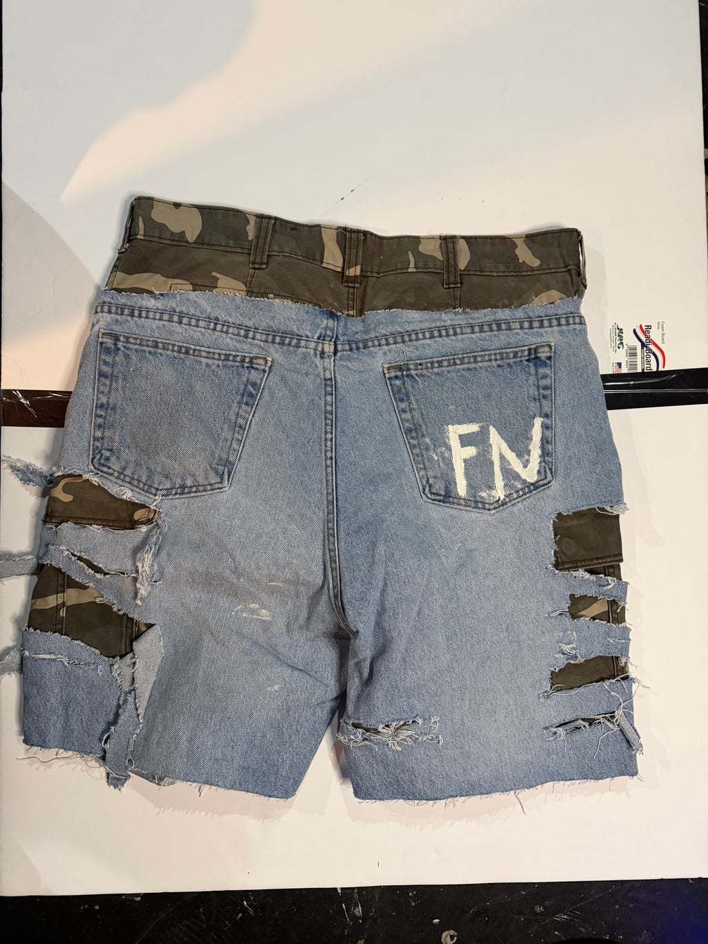 Custom camo denim shorts